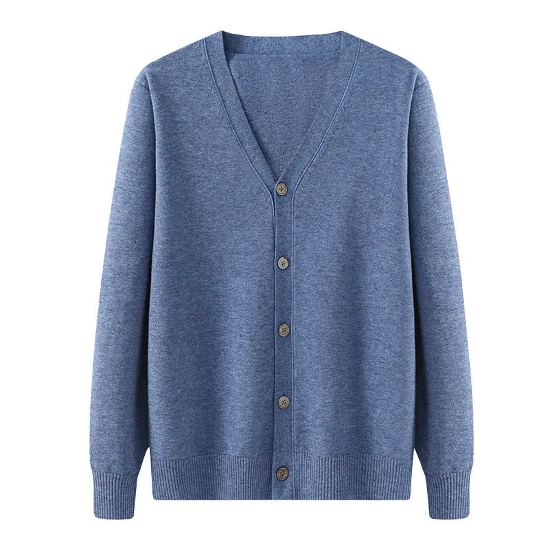 Man wearing a beige V-neck Andy velvet cardigan coat with long sleeves