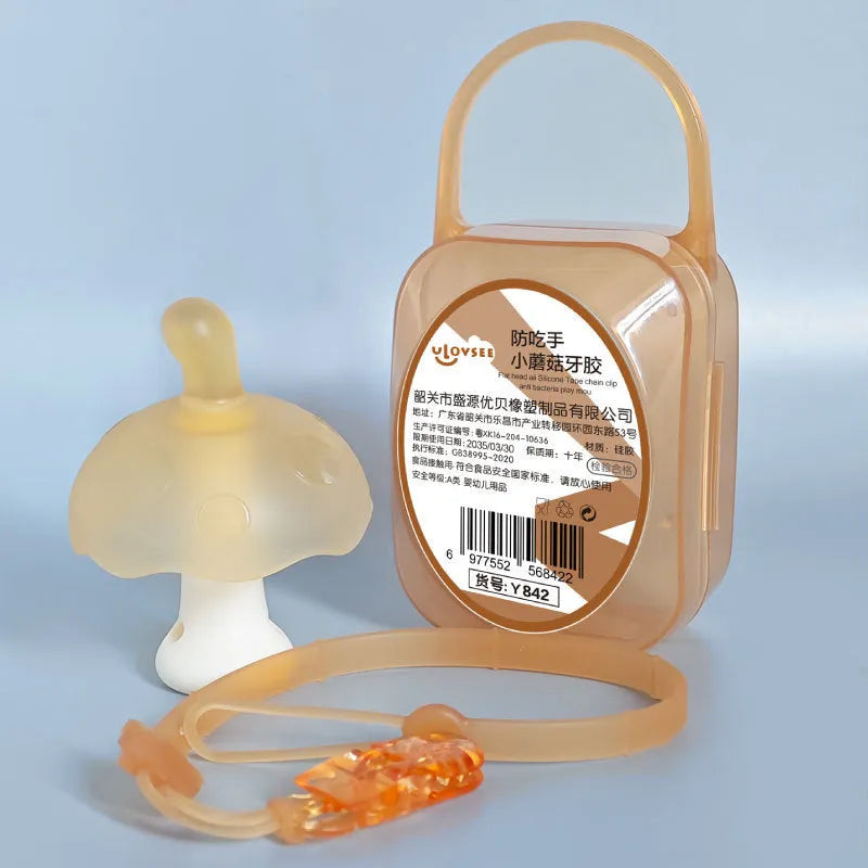 Small pink and nano coloured mushroom-shaped chewable silicone jewellery with a transparent chain and box.