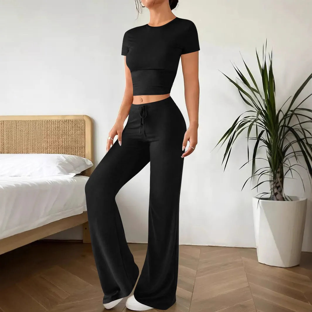 Black women's co-ord suit set with high-waist trousers and short-sleeve t-shirt
