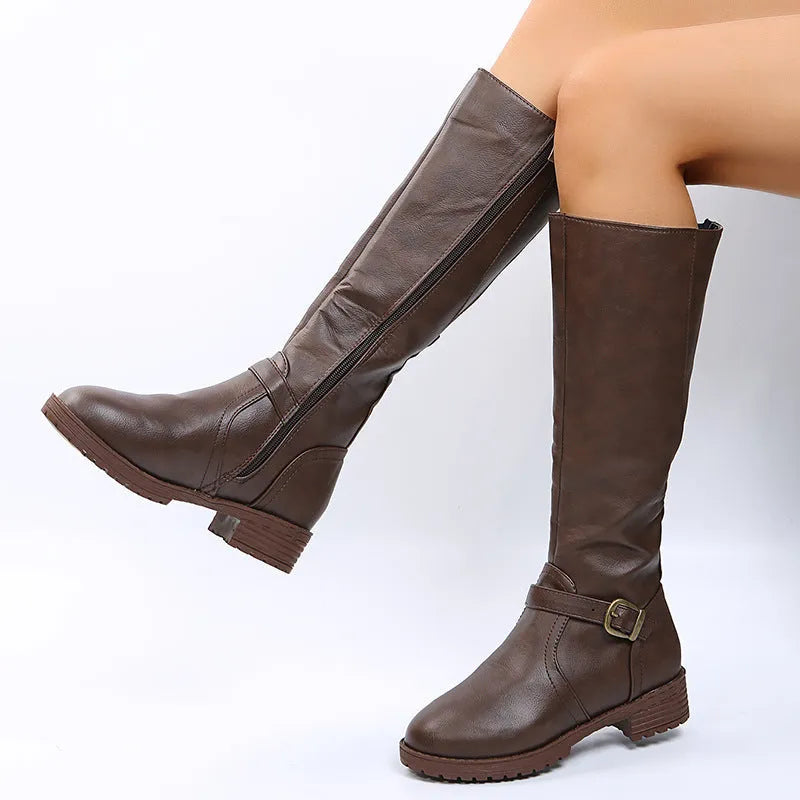 Women's black knight-style high boots with a round toe, buckle detail, and a square heel.
