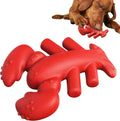 Red heavy-duty nylon chew bone toy for large breed dogs on a plain background