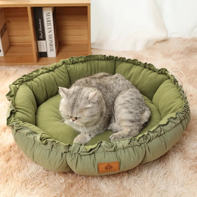 Grey reversible donut pet bed with raised rim for cats and small dogs