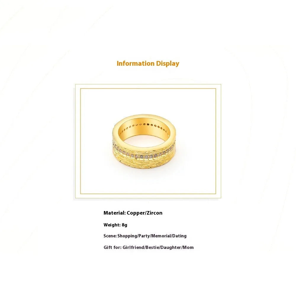 Gold geometric women's zircon ring on a copper base, shown in size 7