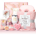 Modern plastic box containing an aromatherapy gift set with scented candles and soap bars.