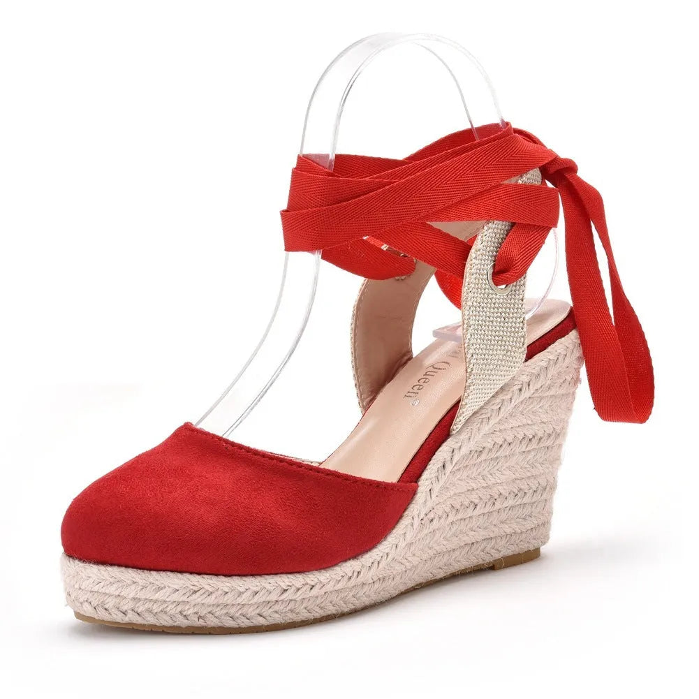Women's apricot bohemian wedge sandals with tassel beads, buckle strap, and a high platform sole.