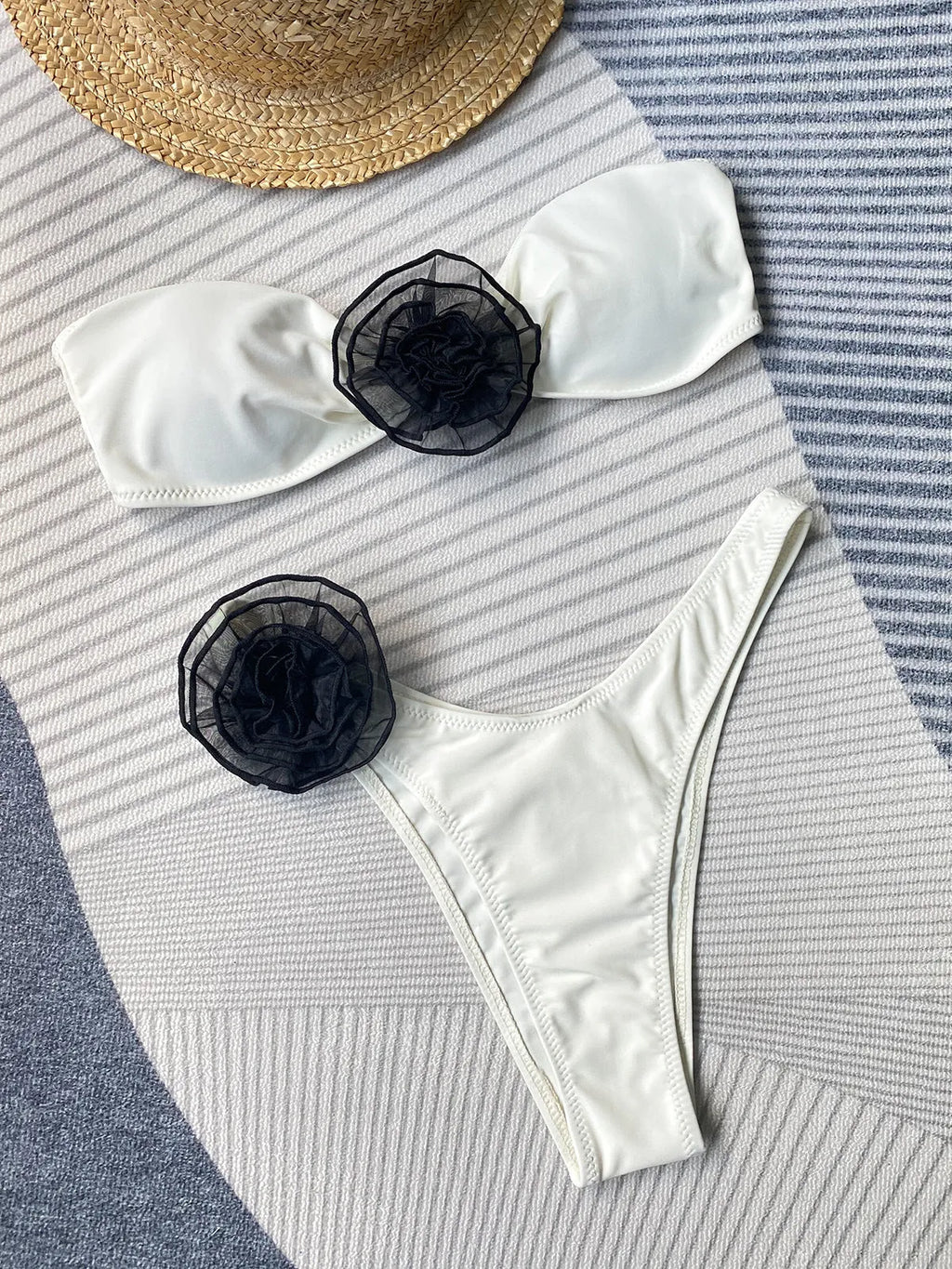 Women's bikini swimsuit with tube top and floral split detail in striped, black or white colours