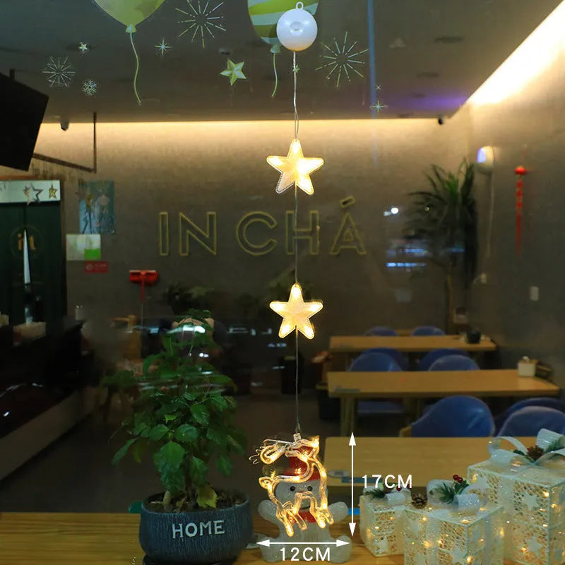 Christmas window lights with star-shaped LED pendants and suction cups for battery-operated festive decoration
