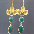 Gold retro women's drop earrings with French leaves, a tassel, and zircon water drop details.