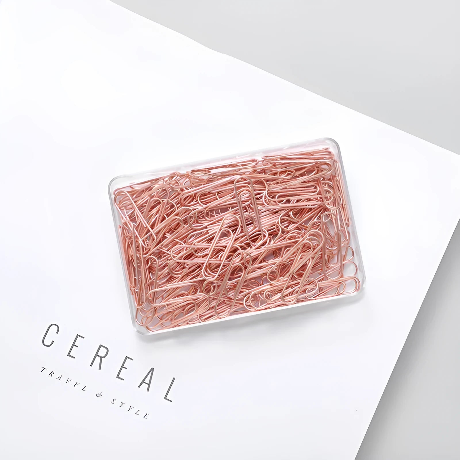 Rose gold heart-shaped metal paper clips measuring 28mm with steel core construction