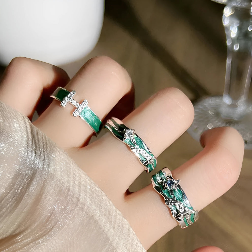 Mint green enamel asterism ring with copper construction and eight-awm star design