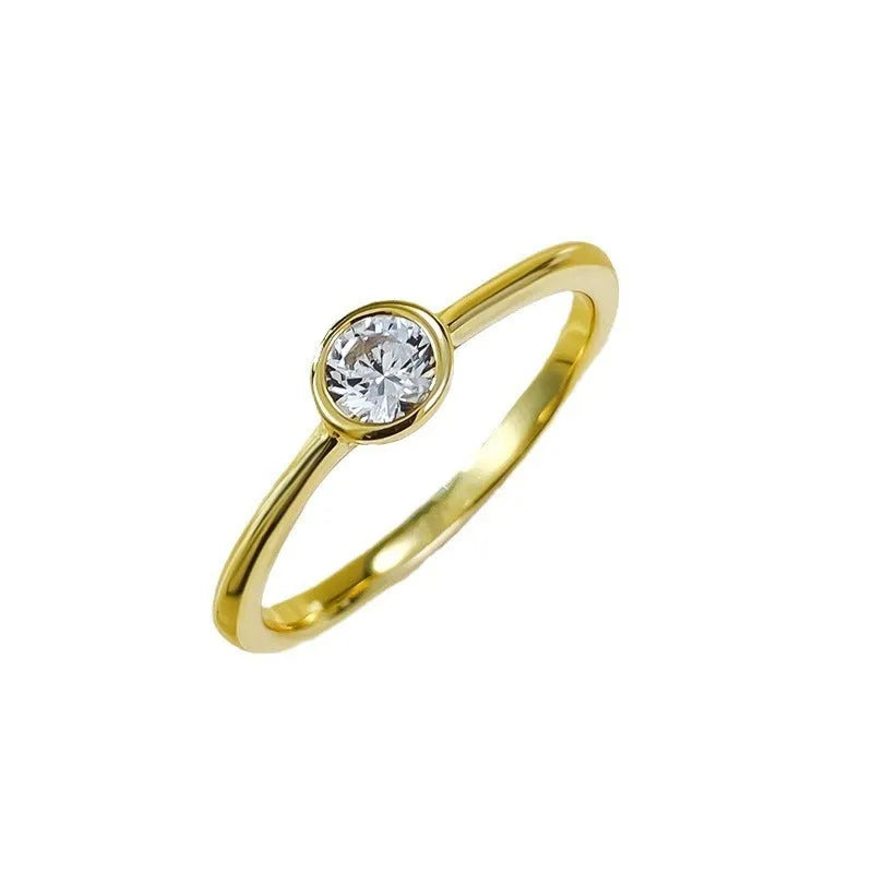 Minimalist sterling silver ring with crown shape and engraved line detail in gold or platinum finish