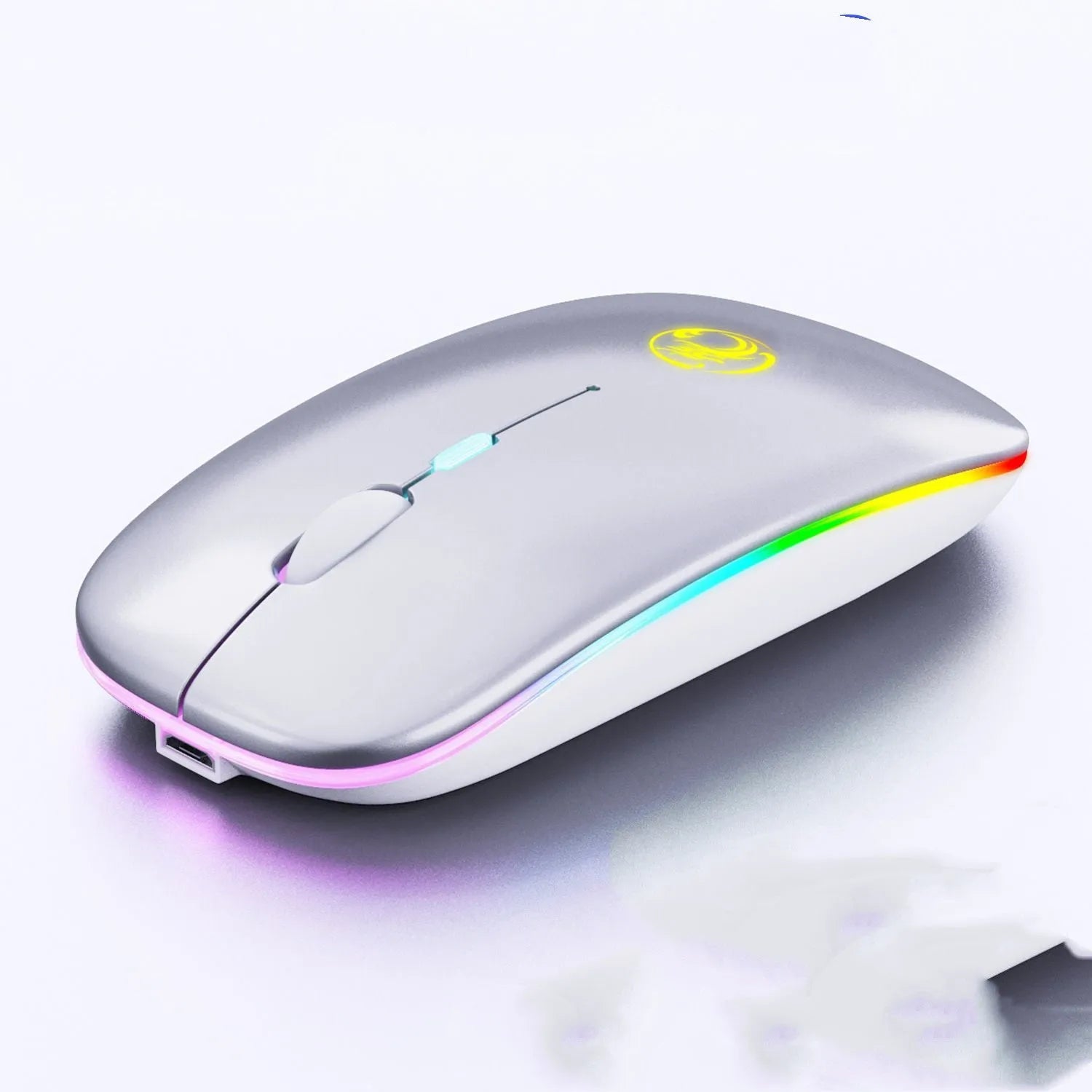 Black and white dual-mode wireless silent mouse with USB charging cable on a desk.