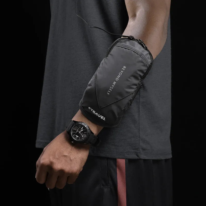 Lightweight reflective running arm bag in fluorescent yellow, shown on an arm.