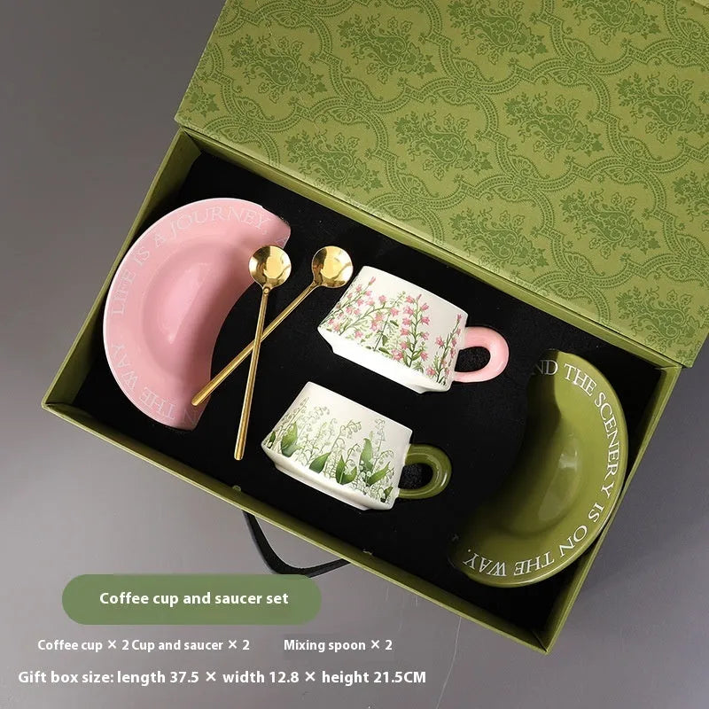 Ceramic coffee cup and saucer set for couples with two cups, saucers, and spoons