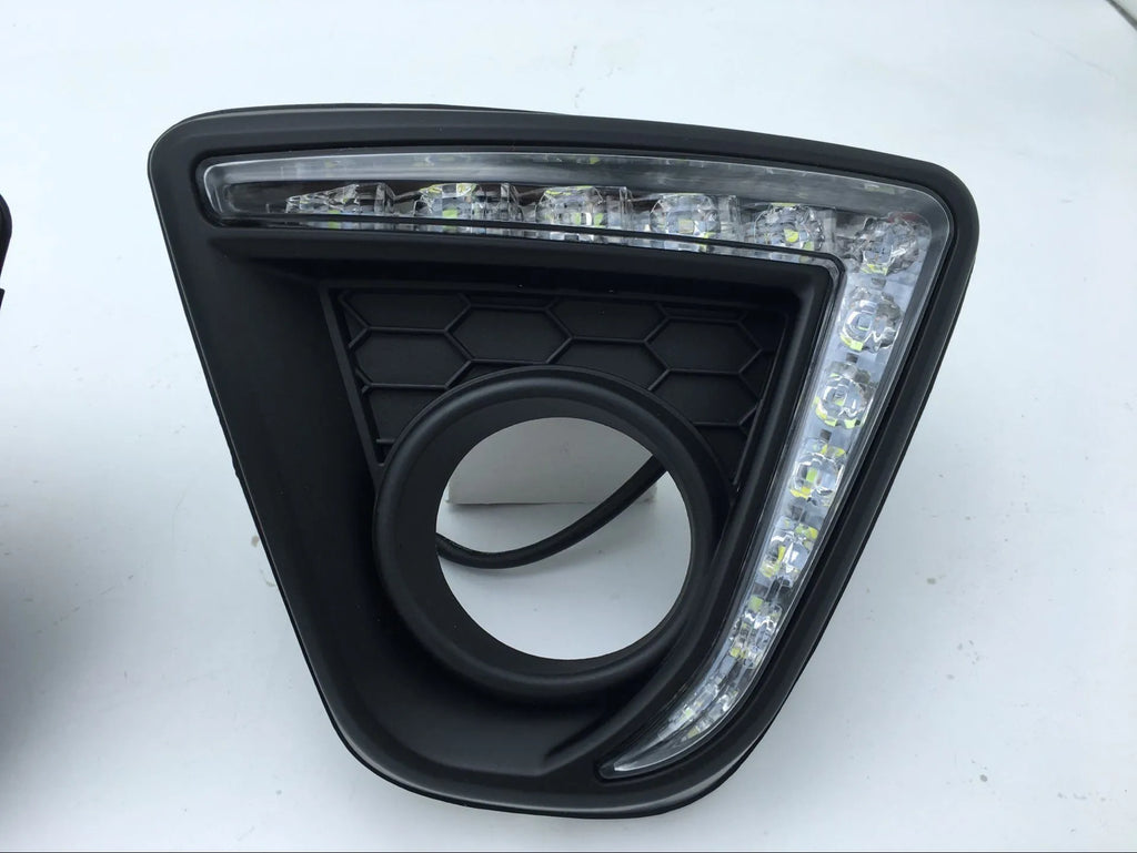 Set of two silver electroplated daytime running light units for a Mazda CX-5 car.