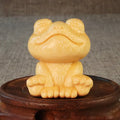 Solid bamboo smiling frog carving ornament measuring 5cm high with cartoon design