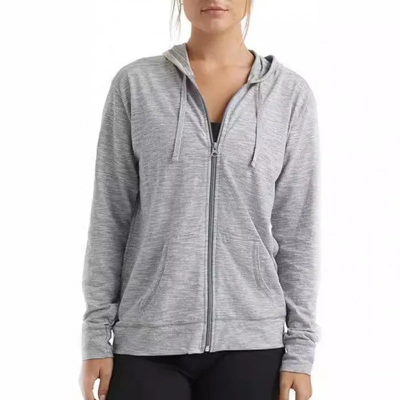 A loose-fit solid colour sports hoodie pullover with long sleeves, shown in one of six available colours.