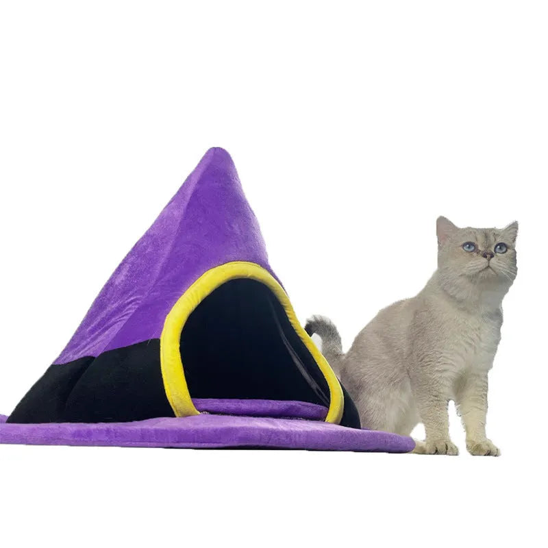 Purple Halloween witch hat shaped cloth cat bed with a fleece cushion inside.