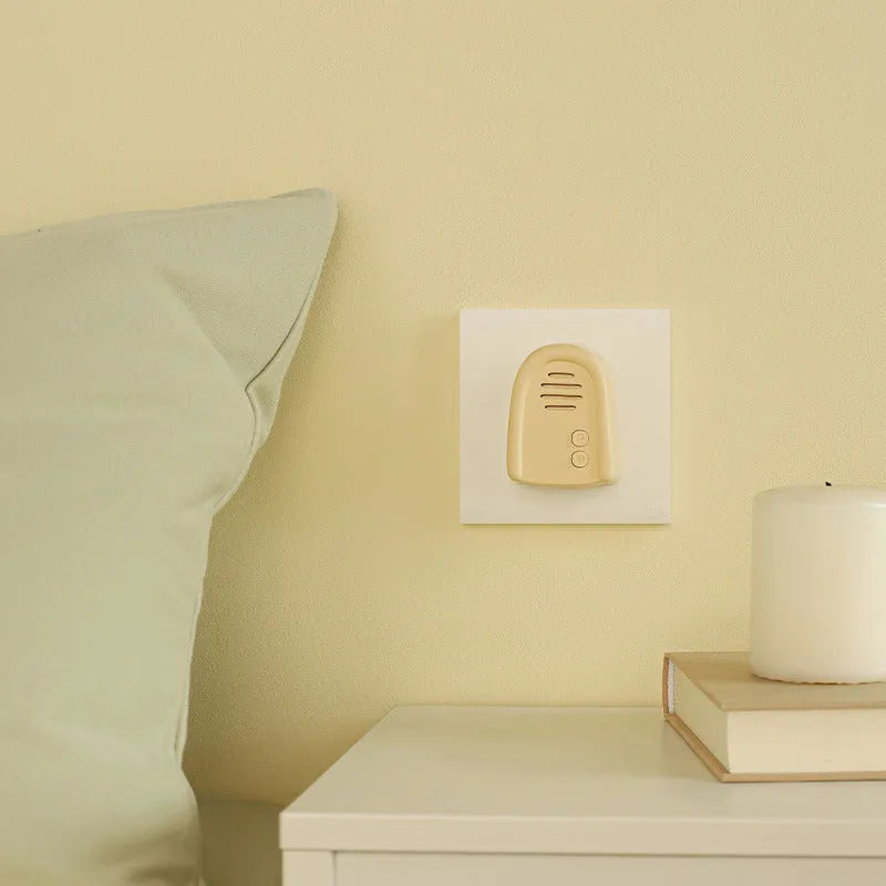 Wireless plug-in doorbell unit in milky yellow or white colour with self-generating beeper