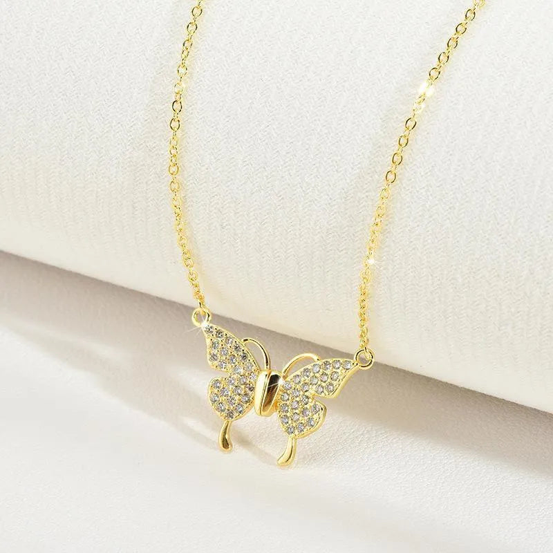 Gold and silver magnetic clasp butterfly necklace on twisted titanium steel chain
