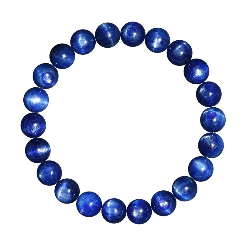 Blue crystal ball bracelet with geometric design and Ruyi motif on a white background.