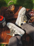 Green star-pattern low-top casual shoes with laces and a thick rubber sole.