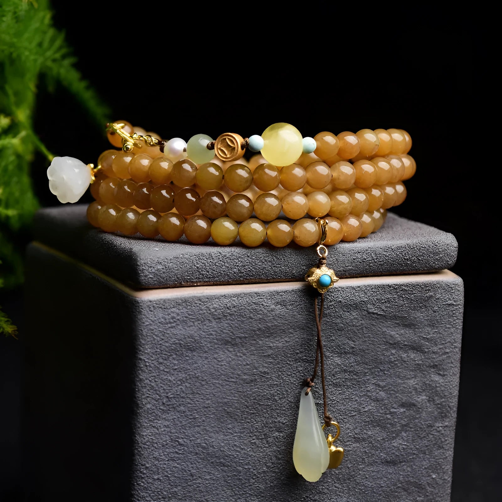 Jade beaded bracelet with green pine 6mm round beads, leaf charms, and beeswax accents