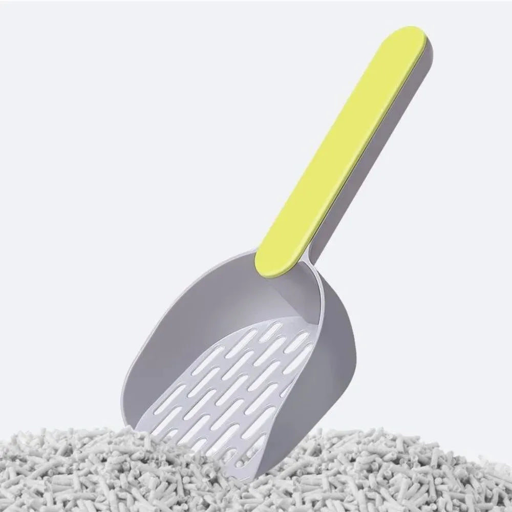 Blue plastic cat litter shovel on a white background showing its size and scoop shape.