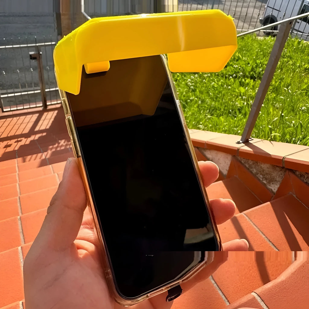 Yellow and black plastic phone clip with an attached sunshade for outdoor screen visibility.