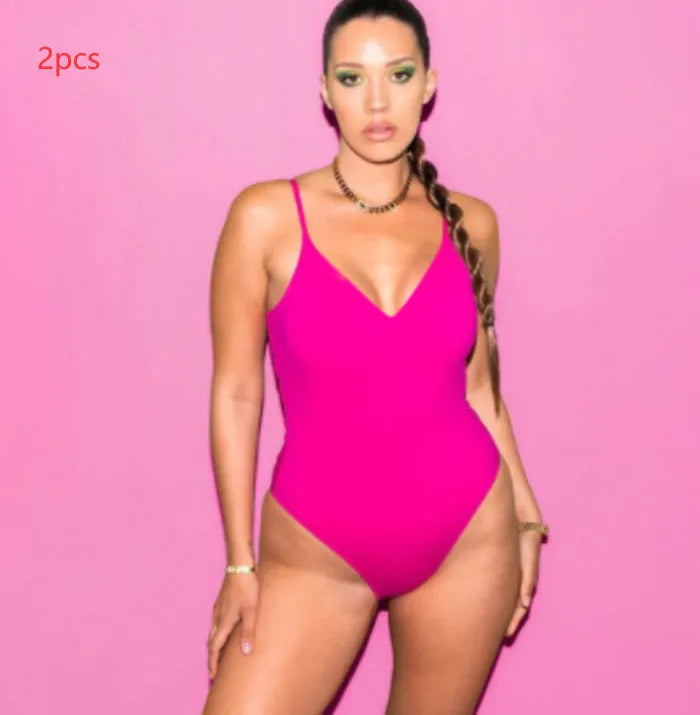 Women's solid colour backless triangle bikini set with string ties on a mannequin.