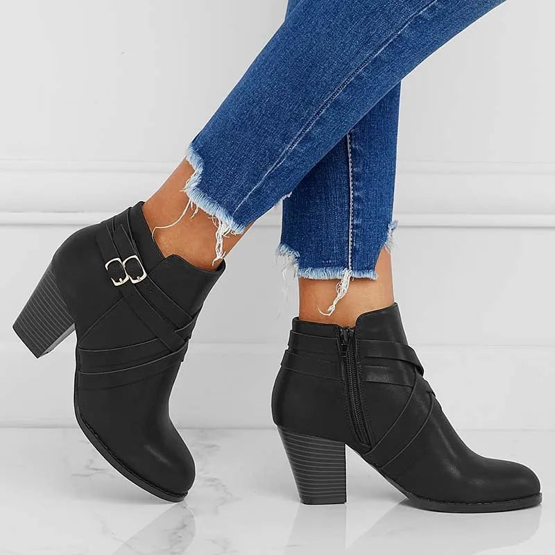 Women's short ankle boots with a side zipper and 7cm heel, shown in grey colour.