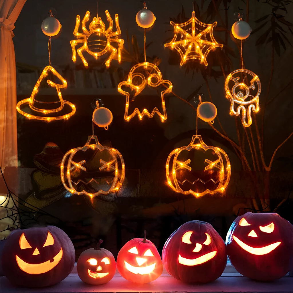 Halloween LED window lights with suction cups showing ghost, spider, and pumpkin decorations