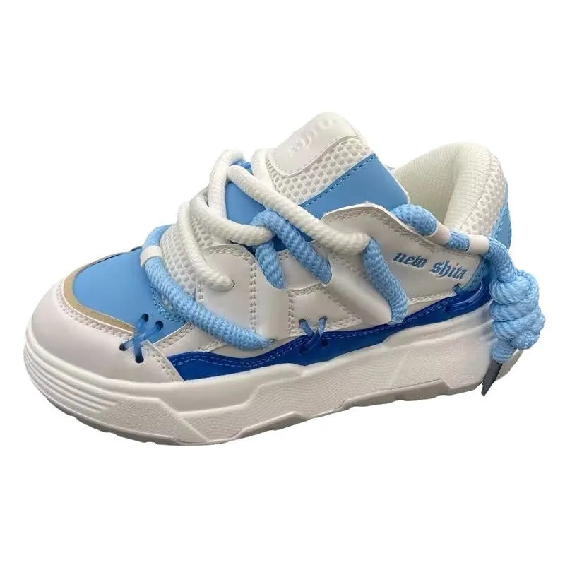 Women's black retro chunky sneakers with thick rubber platform sole and front lace-up.