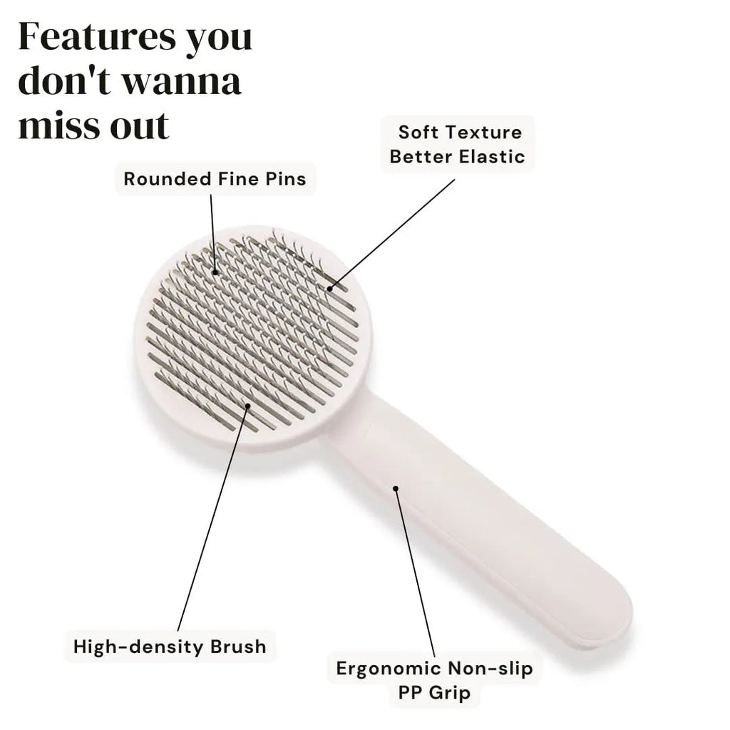 Self-cleaning pet grooming brush with stainless steel tips and blue rubber handle