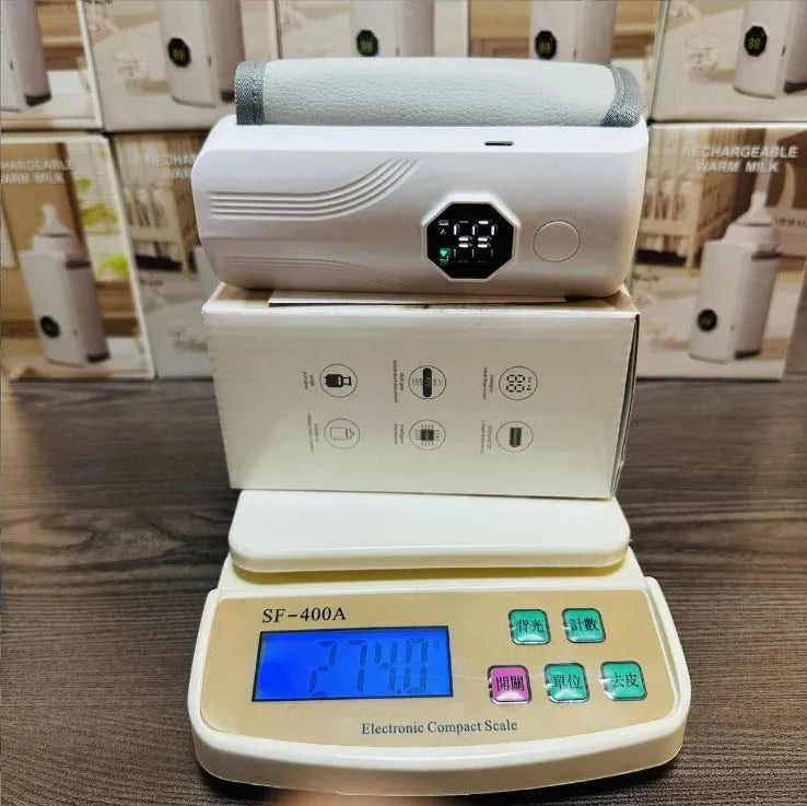 Grey and white car charger electric milk warmer with ABS polypropylene body and pu leather cover.