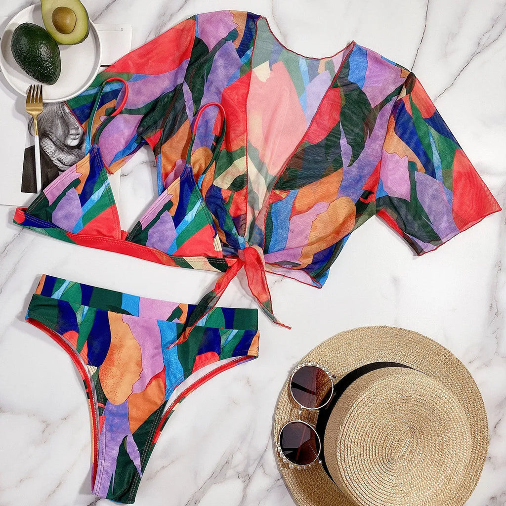 Red printed women's split swimsuit bikini on a mannequin.