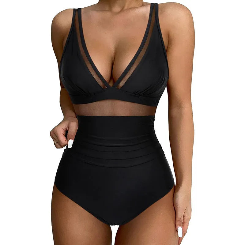 Black halter neck one-piece swimsuit with brief-style bottom on a female mannequin.