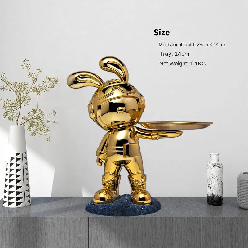Decorative resin rabbit key storage box for home entry in white colour on a wooden table