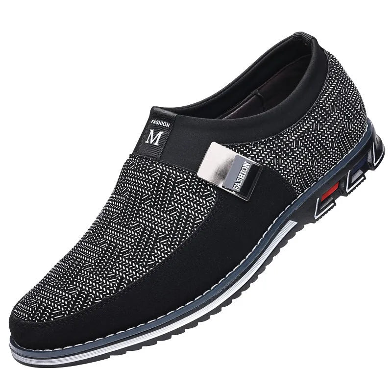 Men's grey and white low-top casual shoes with a square toe and flat rubber sole.