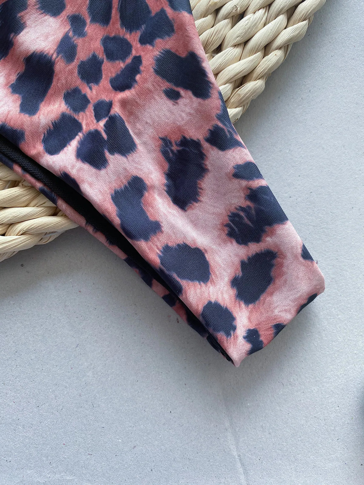 Women's leopard print and black bikini set with tube top and split-style briefs