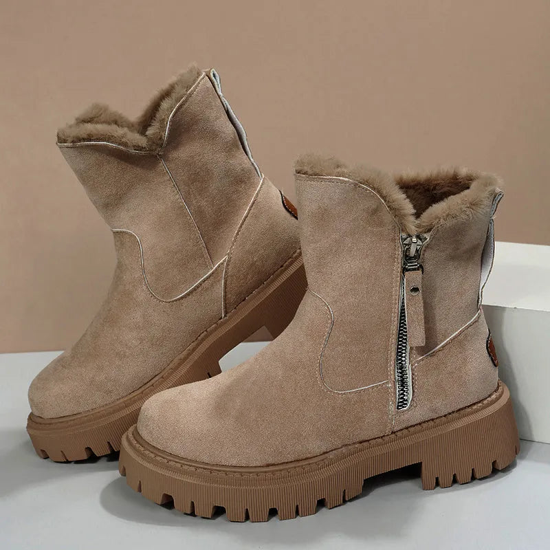 Women's black high-top faux suede snow boots with side zip and thick plush lining on a rubber sole.