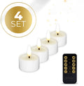 Set of four white LED tealight candles with flickering flame effect on a table.