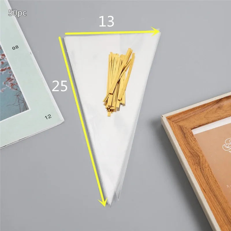 Clear triangle-shaped plastic packaging bag with a twisted top secured by a white tie wire.