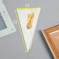 Clear triangle-shaped plastic packaging bag with a twisted top secured by a white tie wire.