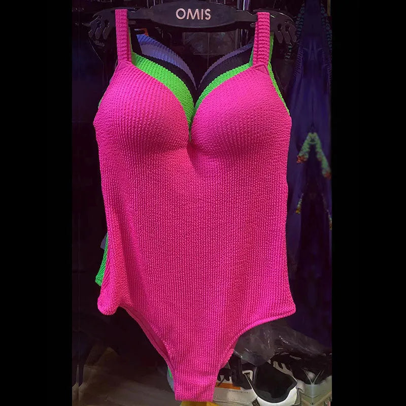 Women's sleeveless one-piece swimsuit in polyester fabric for swimming.