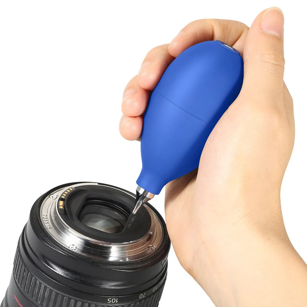 Blue and black handheld rubber dust blower for cleaning cameras and phones.