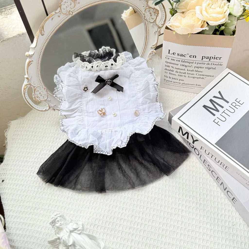 White polyester waltz gauze skirt princess dress for a small dog on a hanger.