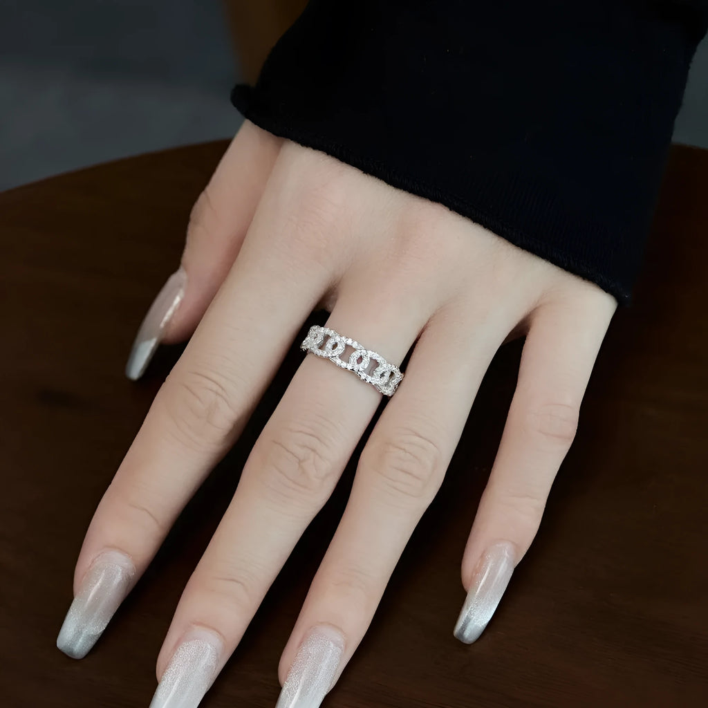 Silver punk chain ring for women with electroplated finish on white background