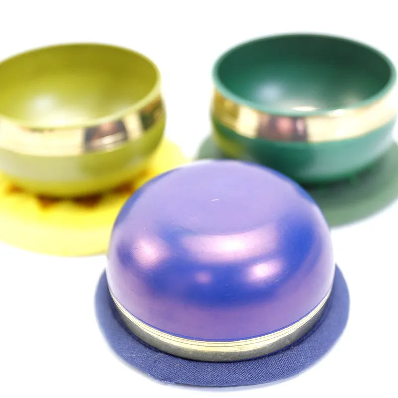 Handmade 8 cm diameter metal singing bowl in a choice of seven colours for meditation and yoga.