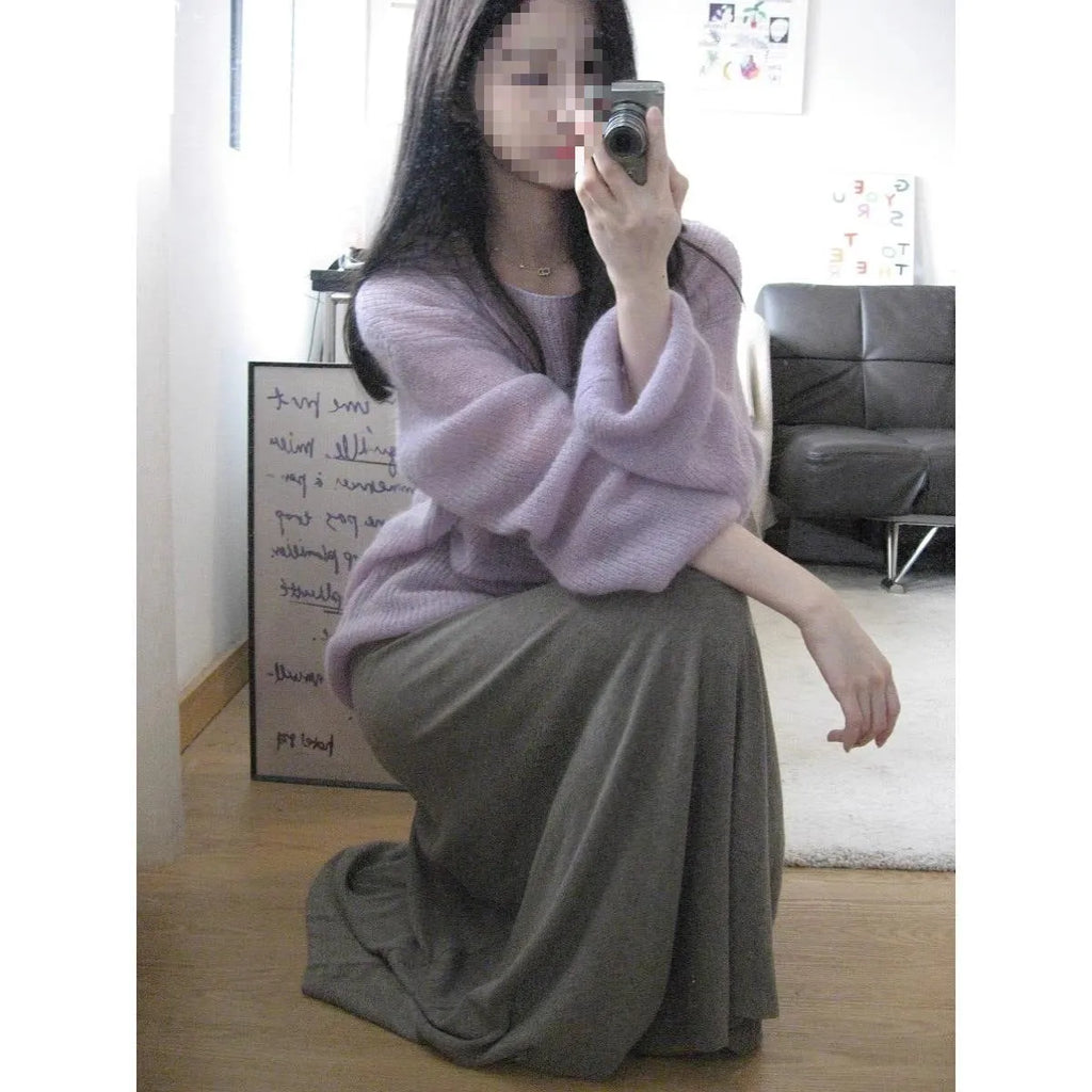 Purple ice silk women's blouse with hollow-out design and princess sleeves on a hanger.